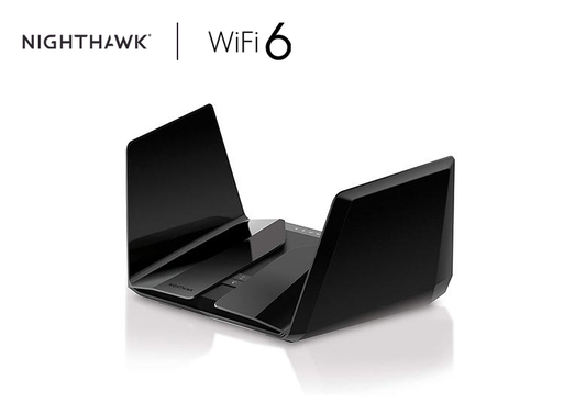 An image presenting the Netgear Nighthawk AX12 12-Stream WiFi 6 Router (RAX200), boasting AX11000 Tri-Band Wireless Speeds of up to 10.8 Gbps. Designed for large homes, it features comprehensive coverage. Equipped with 4 x 1G and 1 x 2.5G Ethernet Ports as well as 2 x 3.0 USB ports, all housed in a sleek black design.