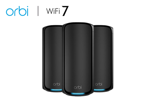 An image presenting the BE27000 Mesh WiFi System (RBE973SB), part of the Orbi 970 Series Quad-Band WiFi 7 Mesh System. This 3-pack system offers speeds of up to 27Gbps and includes a 1-year NETGEAR Armor subscription for enhanced network security.